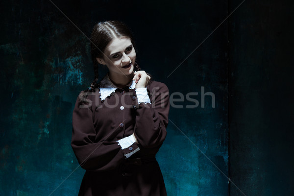 Portré fiatal mosolyog lány iskolai egyenruha gyilkos Stock fotó © master1305
