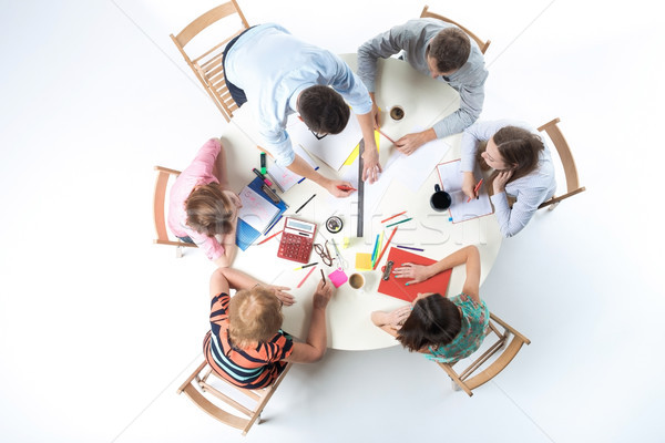 Felső kilátás üzleti csapat munkaterület ül asztal Stock fotó © master1305