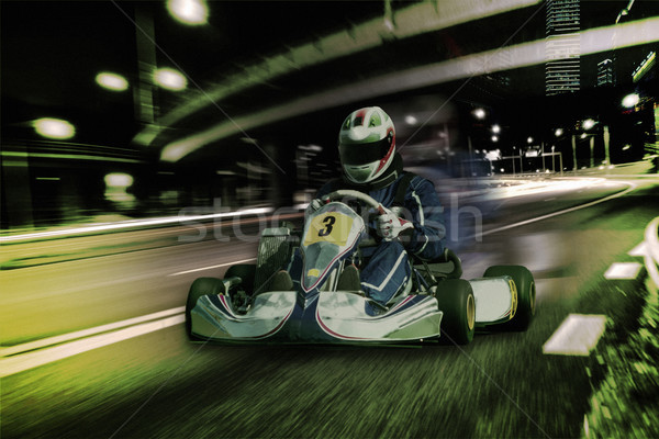 Karting - driver in helmet on kart circuit Stock photo © master1305