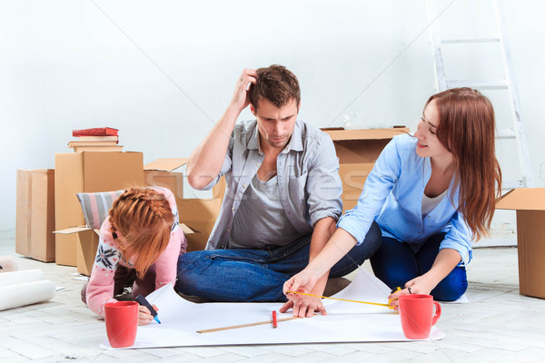 The happy family  at repair and relocation Stock photo © master1305