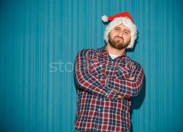 The opinionated christmas man wearing a santa hat Stock photo © master1305
