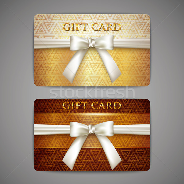 set of golden gift cards with white bows  Stock photo © maximmmmum
