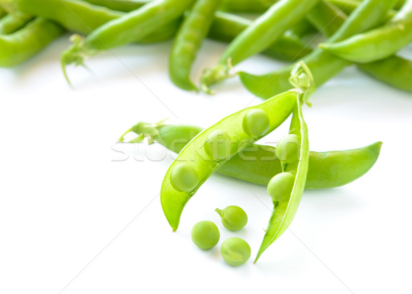 Stock photo: Fresh Sweet Green Pea Pods and Ceeds Isolated on White Background