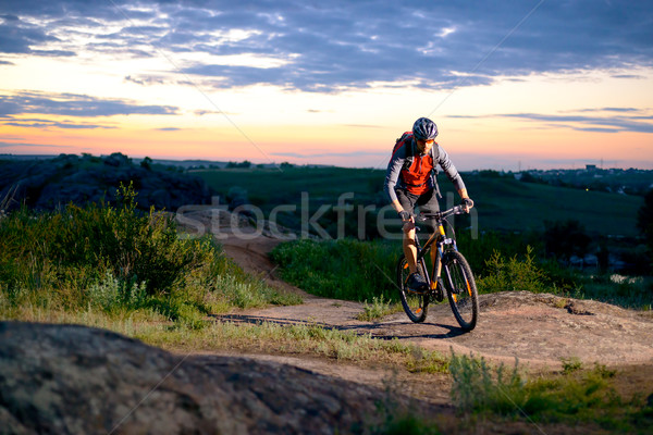 Ciclista equitazione bike montagna percorso tramonto Foto d'archivio © maxpro