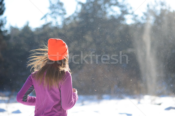 Young Woman Running in Beautiful Winter Forest at Sunny Frosty Day. Active Lifestyle Concept. Stock photo © maxpro