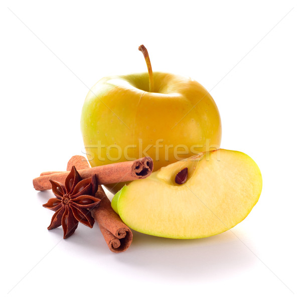 Yellow Apple with Apple Slice, Cinnamon Sticks and Anise on the  Stock photo © maxpro