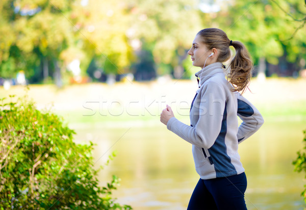 Stock photo: Young Beautiful Woman Running in the Autumn Park