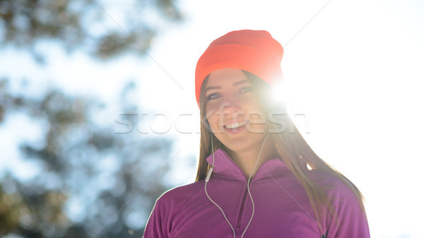 Młoda kobieta runner uśmiechnięty piękna zimą lasu Zdjęcia stock © maxpro