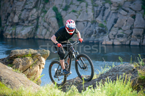 Stock photo: Professional Cyclist Riding the Bike on the Beautiful Spring Mountain Trail. Extreme Sports