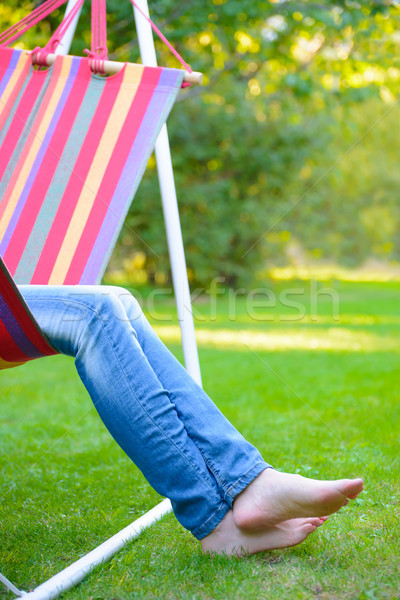 Nő mezítláb lábak zöld fű kert természet Stock fotó © maxpro