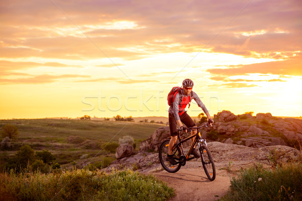 Ciclista equitazione bike montagna percorso tramonto Foto d'archivio © maxpro