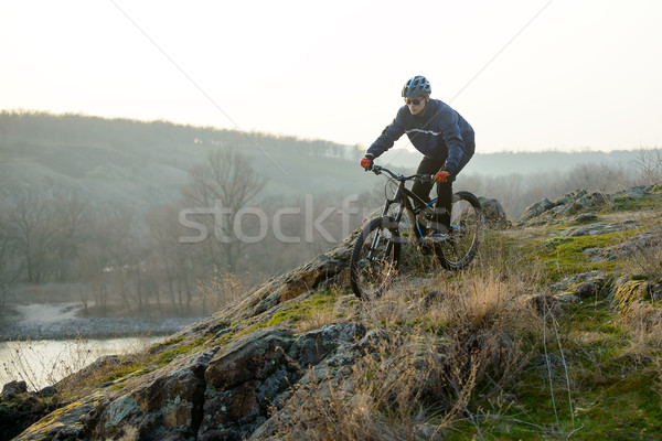 Enduro Cyclist Riding the Mountain Bike Down Beautiful Rocky Trail. Extreme Sport Concept. Space for Stock photo © maxpro