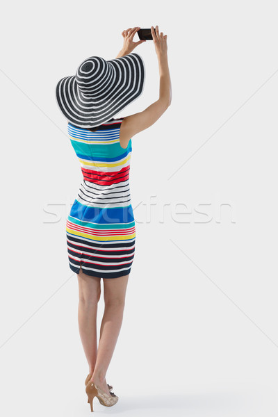 Woman photographing mockup, full length Stock photo © maxsol7