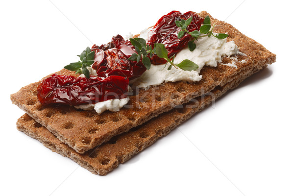 Stock photo: Bread crisps with dried tomato, cheese and thyme