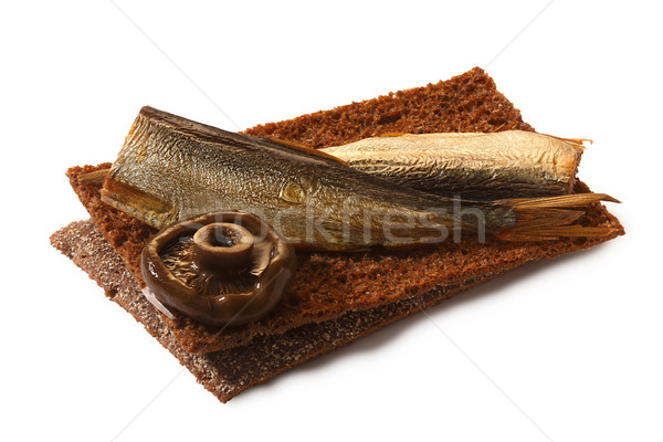 Stock photo: Bread crisp with smoked sprats, soft cheese and mushroom