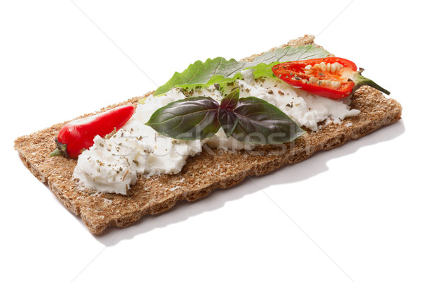 Bread crisp with pepper,soft  cheese and basil Stock photo © maxsol7