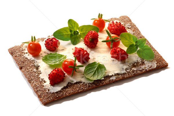 Bread crisp with fresh strawberries, soft cheese and mint Stock photo © maxsol7