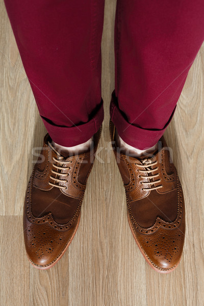 Sockless legs in pants and brogue Stock photo © maxsol7