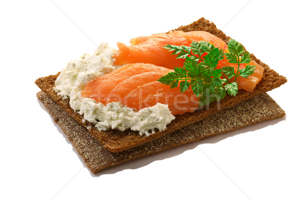 Bread crisp with salmon, soft cheese and chervil Stock photo © maxsol7