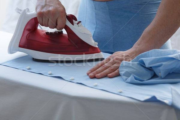 Man strijken shirt mannelijke Blauw ondergoed Stockfoto © maxsol7