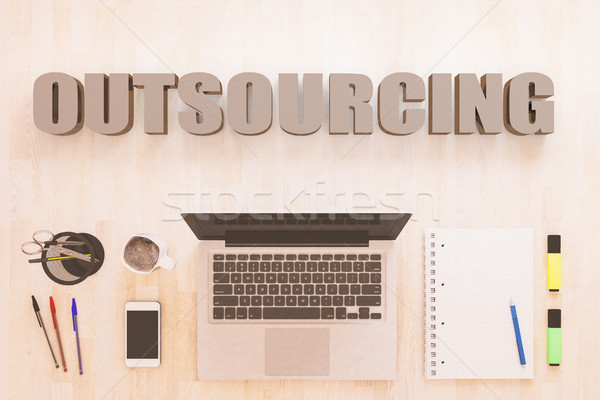 Outsourcing tekst notebook computer smartphone pennen Stockfoto © Mazirama