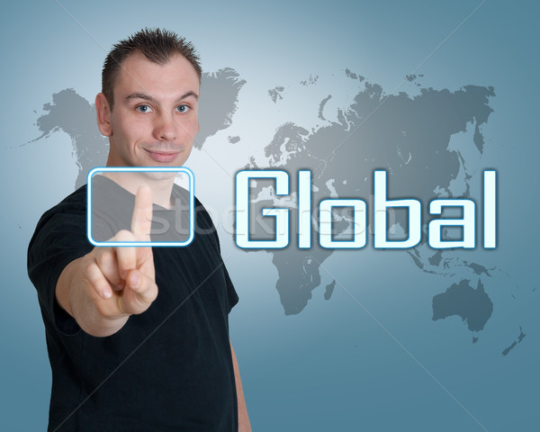 Globális fiatalember sajtó digitális gomb interfész Stock fotó © Mazirama