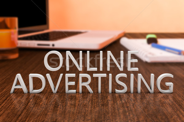Online reklamy litery biurko laptop Zdjęcia stock © Mazirama