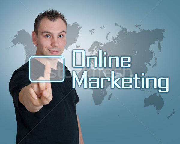 Интернет маркетинг молодым человеком прессы цифровой кнопки интерфейс Сток-фото © Mazirama
