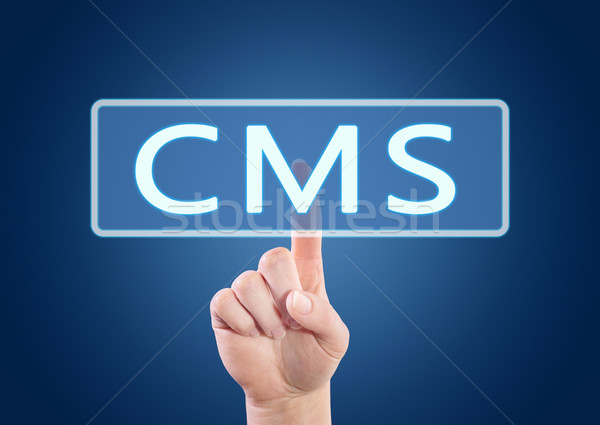 Continut administrare cms mână buton Imagine de stoc © Mazirama