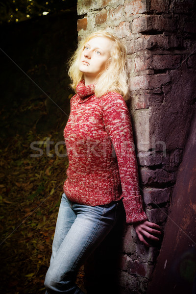 Young blond woman daydreaming at night Stock photo © Mazirama