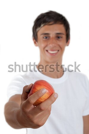 Manzana jóvenes hombre ojos marrones manzana roja mano Foto stock © Mazirama