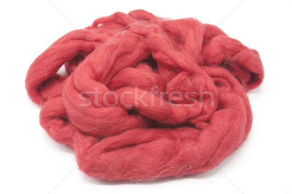 Cerise red piece of Australian sheep wool Merinos breed close-up on a white background Stock photo © mcherevan