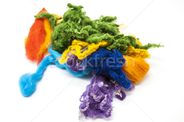 Multi-colored piece of Australian sheep wool Merino breed close-up on a white background. Stock photo © mcherevan