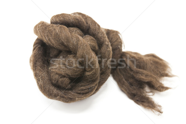 Brownpiece of Australian sheep wool Merino breed close-up on a white background Stock photo © mcherevan