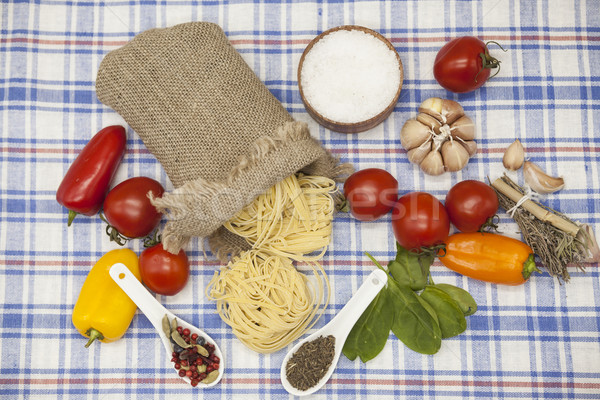Stock photo:  Tagliatelle Italian pasta set for the creation : cherry tomatoes, olive oil, balsamic sauce, garlic