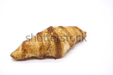 Dukan Diet. Fresh delicious croissant at Dukan Diet on a white background. Stock photo © mcherevan