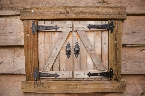 Stock photo: Old window on the wooden wall