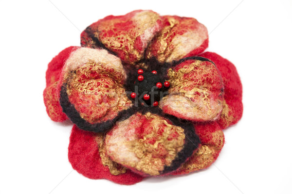 Beautiful red rose flower milled wool with beads on a white background. Stock photo © mcherevan