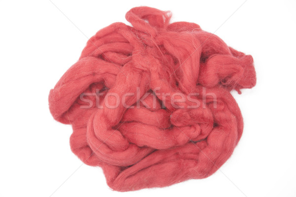 Cerise red piece of Australian sheep wool Merinos breed close-up on a white background Stock photo © mcherevan