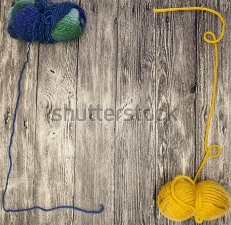 Excellent mocap  with a ball of wool thread  on a wooden background Stock photo © mcherevan