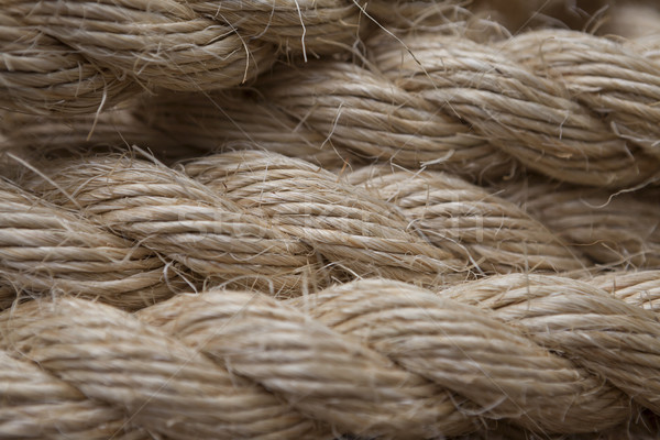 Stock photo: Roll of ship ropes as background texture