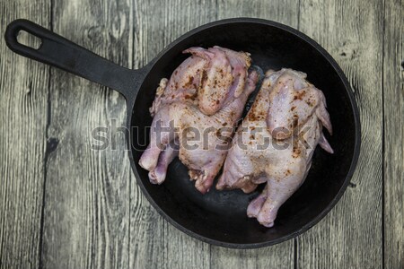 Two raw fresh chicken on porcelain plate  on the wooden background Stock photo © mcherevan