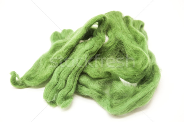 Olive green piece of Australian sheep wool Merino breed close-up on a white background Stock photo © mcherevan