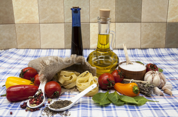 Beautiful set for the creation of the Sicilian pasta: cherry tomatoes, olive oil, balsamic sauce, ga Stock photo © mcherevan