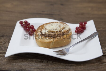 Dukan Diet. Fresh delicious diet cake at Dukan Diet on a porcelain plate with a spoon on a wooden ba Stock photo © mcherevan