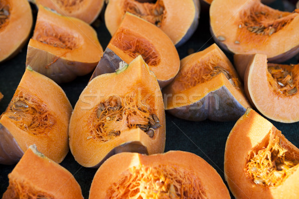Large tasty slices of pumpkin with seeds. Pumpkin slices. Stock photo © mcherevan