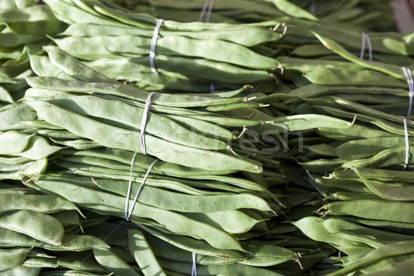 Bundles of fresh green beans . Green beans, Hanging haricot bean, Phaseolus vulgaris pods alone. Clu Stock photo © mcherevan