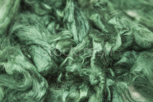 Aquamarine green piece of Australian sheep wool Merino breed close-up on a white background Stock photo © mcherevan