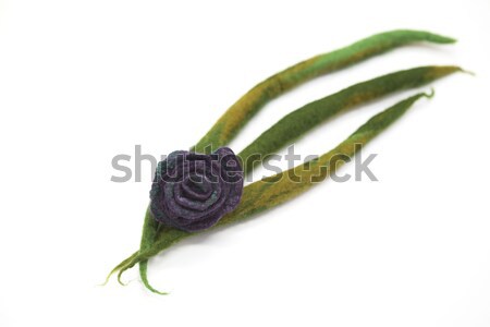 Beautiful hand-made brooch felted wool sheep, blue-green shades on a white background. Stock photo © mcherevan