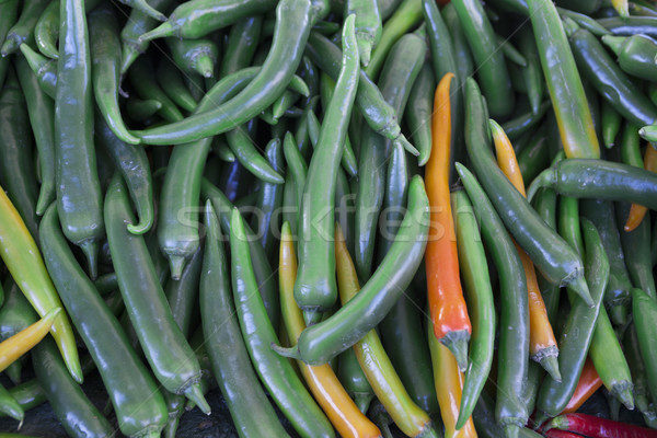Chilli closeup, green yellow pods on the counter market. Chile pepper, Cayenne pepper, Pungent bouqu Stock photo © mcherevan